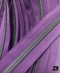 Zipper by the yard #5, Nylon Coil Metallic Gunblack on Eggplant Purple